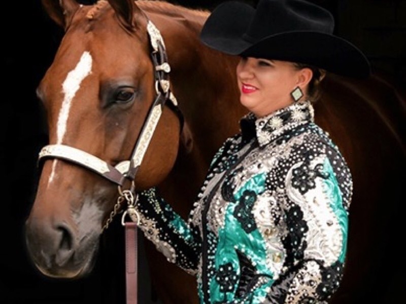 Crystal-covered western show jacket and matching rhinestone horse halter