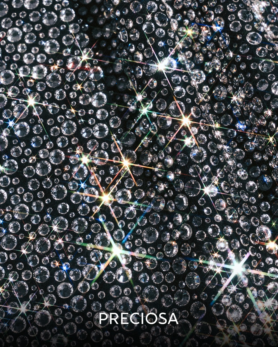 Macro close-up of Preciosa MAXIMA crystals sparkling with rainbow light flares
