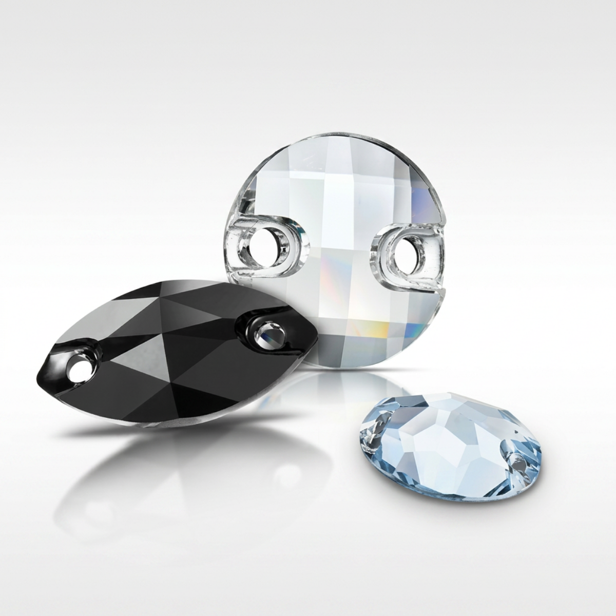Navette, oval, and round sew-on stones in black, crystal, and light blue